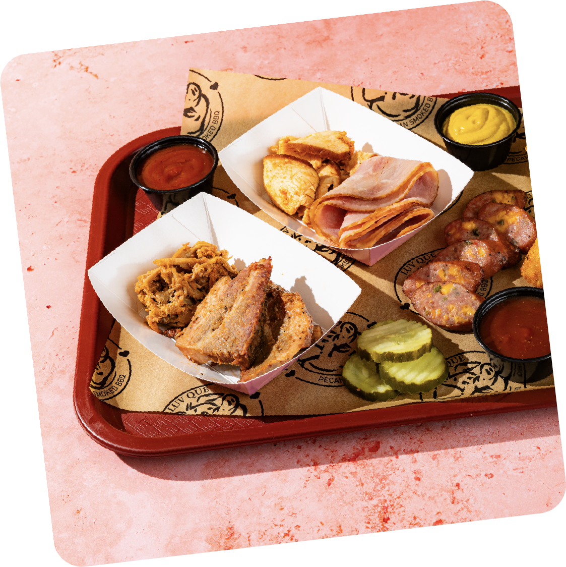 Luv Que sampler platter on a red tray